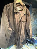 Full view of brown L.L.Bean jacket hanging