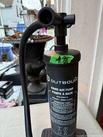 Full view of Outbound hand air pump with hose attached