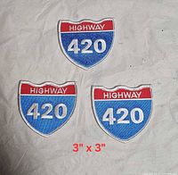 Three identical shield-shaped "HIGHWAY 420" embroidered patches laid on fabric with size text 3" x 3"