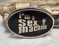 Front view showing black enamel surface and raised silver lettering