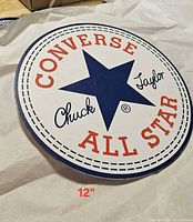 Round Converse Chuck Taylor All Star sign