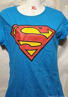 Front view showing Superman emblem and overall condition