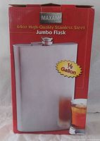 Front of retail box showing Maxam branding and flask image