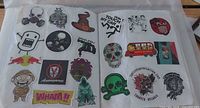 Two album pages showing numerous assorted graphic stickers