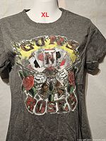 Front view of grey Guns N' Roses girls XL T-shirt showing full graphic
