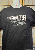 Front view of black The Mars Volta size L T-shirt showing full graphic and condition