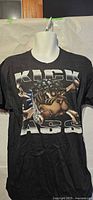 Front view of black T-shirt with KICK ASS bulldog graphic
