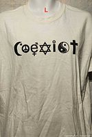 Front view of off-white Coexist graphic T-shirt displayed on mannequin