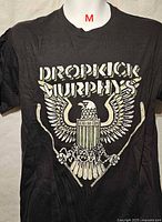 Front view of black T-shirt displaying Dropkick Murphys logo and eagle graphic