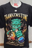 Front of T-shirt showing full FRANKENSTONE graphic and size indicator