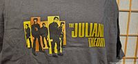 Front of gray T-shirt showing The Julian Theory graphic and size impression