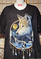Front view showing wolf dreamcatcher graphic and XXL label