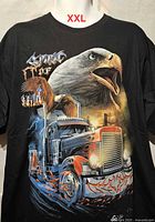 Front view showing full graphic print and XXL tag on mannequin