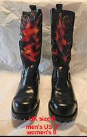 Front view of both boots showing flame panels and toe shape