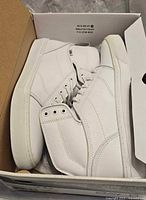 Shoes in original box, side view