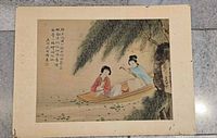 Full view of Chinese silk painting depicting two women in boat under willow, border visible