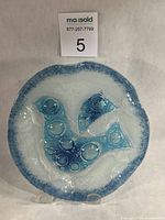 full view of round fused glass dish on stand