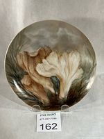 Front view of painted porcelain dish on stand