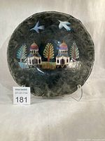 Full front view of signed paper mâché bowl on stand