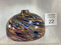 Side view showing overall shape and swirl pattern