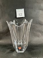 Front view of clear crystal Belle Tulip vase with flared rim and Orrefors sticker visible