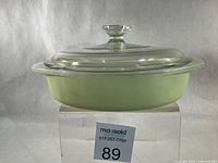 Side view of casserole with lid showing overall shape and colour