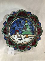 Front view of stained glass plate showing full design