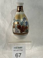 Full view of Kutani porcelain sake flask front