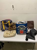 All seven bags laid out on table