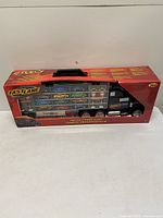 Front view of sealed FastLane carry case box showing contents