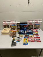 Overall view of all sealed STEM, craft and toy items on table