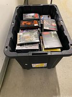 Tote filled with assorted DVD cases