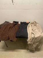 Group shot of all five garments laid on table