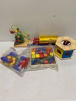 All five toy items arranged together