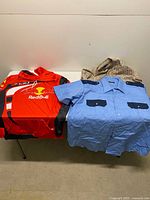 Overview of all three clothing items on table