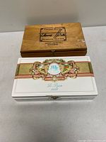Top view of both cigar boxes showing logos and overall appearance