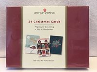 Front of sealed American Greetings box showing product name and sample card images