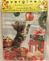 Front of sealed package showing kitten and ornaments design