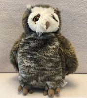 Front view of grey-brown plush owl