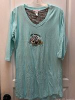 Full front view of mint green nightgown showing size and length