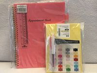 Overall view of appointment book, planner inserts, stickers, pen, ruler