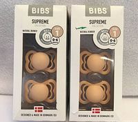 Front view of two sealed BIBS Supreme pacifier boxes