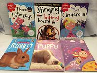 Front covers of all six children’s books displayed in two rows