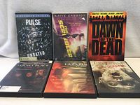 Front view of all six DVD cases