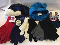 Overview of hats and multiple glove pairs