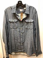 Front view of Levi’s chambray shirt showing full design and chest pockets