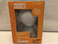 Front of sealed box showing Mini Munny figure and contents information