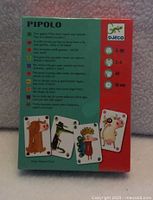 Back of box listing contents, player count, playtime, multilingual description