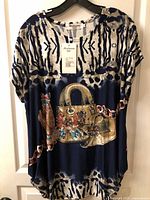 Full front view of Portman top on hanger