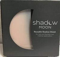 Front of retail box showing brand name and product window